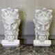 Pair of white statuary marble consoles, with faun heads