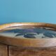 Round Art Deco plate, painted decoration signed, roses