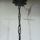 Wrought iron and green glass lantern