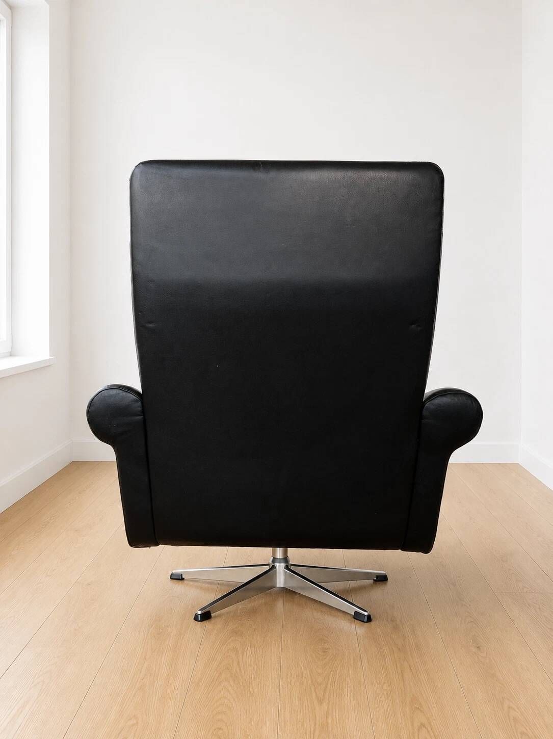 Vintage Danish mid-century black leather swivel chair 1970s