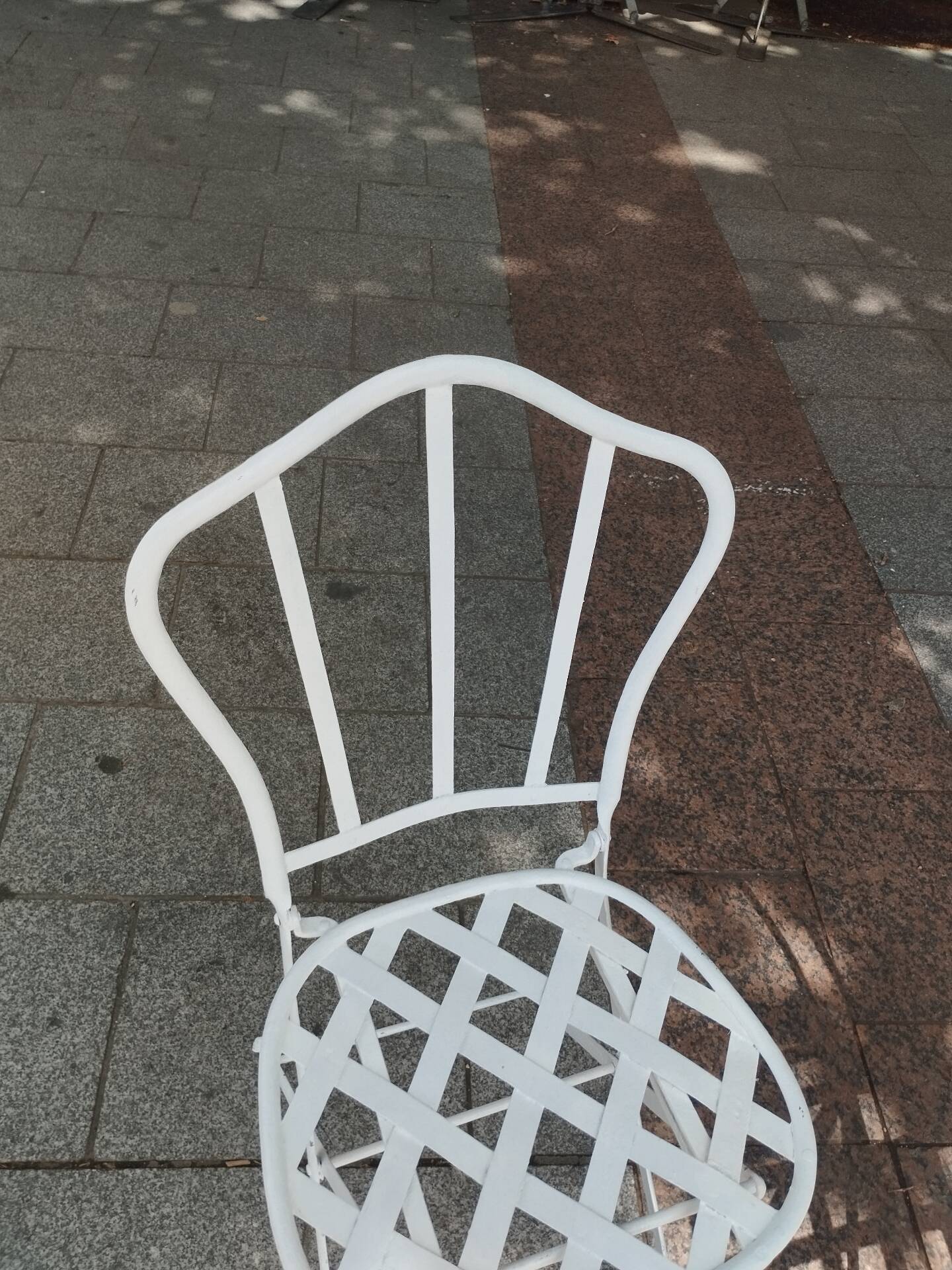 Antique garden furniture in solid wrought iron.