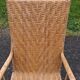 Antique high-back rattan armchair