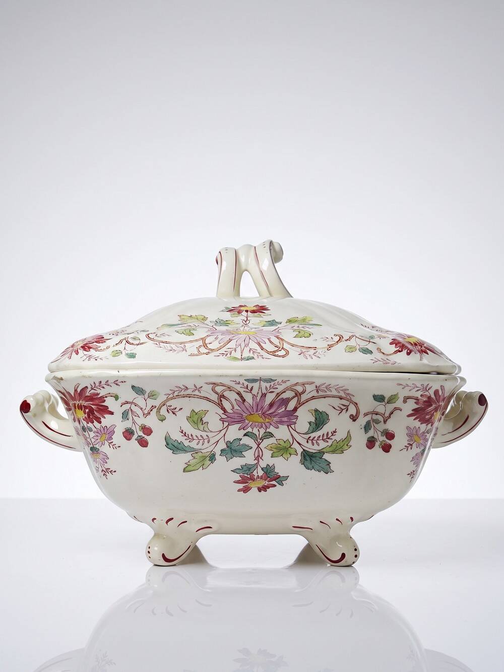 Antique Longchamp soup tureen/vegetable dish with polychrome daisies in ironstone.