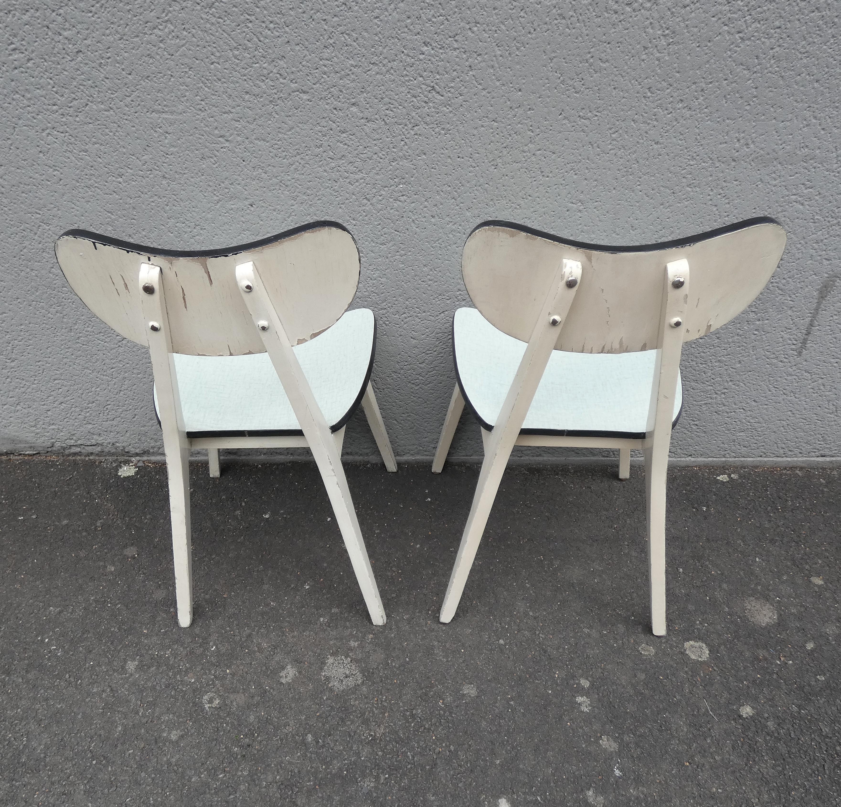 2 chairs in water green formica