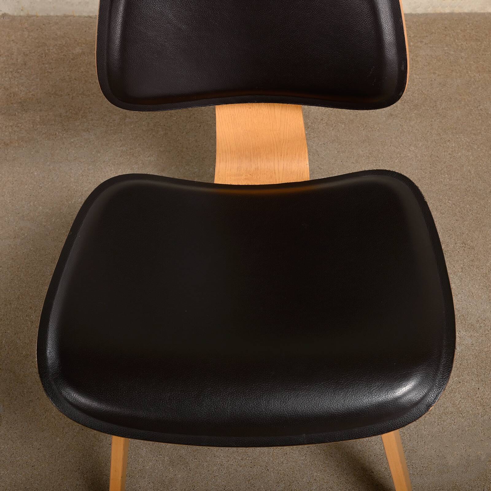 Charles & Ray Eames DCW Ash dining chair with Dark Brown Leather seat for Vitra