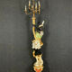 Early XXth era polychrome wooden torch has figuration of a Moor in traditional costume from the 18th