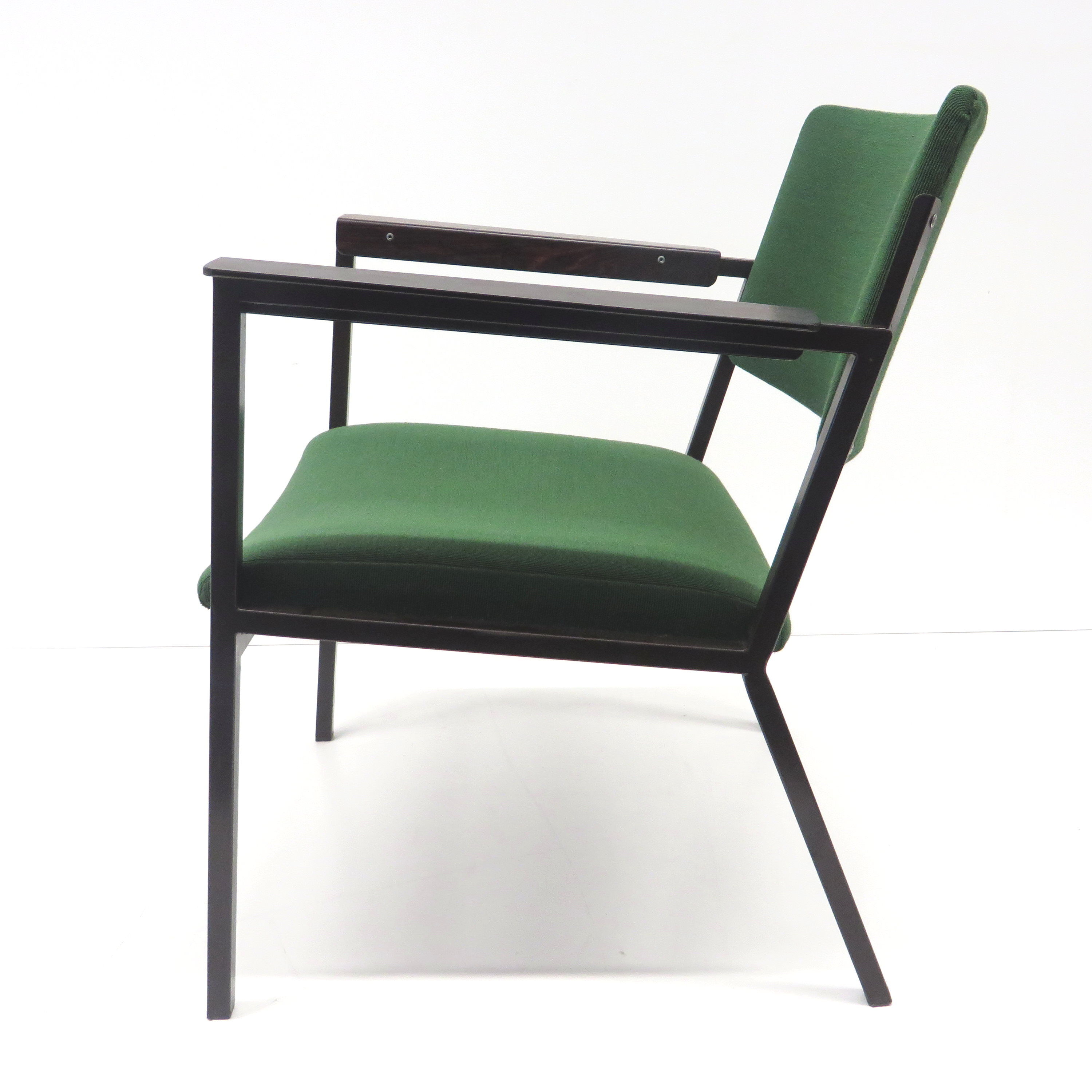 Green vintage armchair with metal frame made in the 60s
