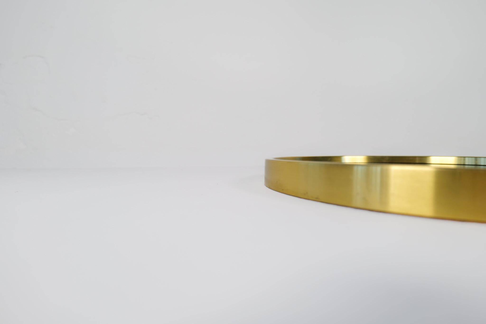 Modern brass mirror from the mid-century by Glasmäster in Markaryd, Sweden, 1960s.