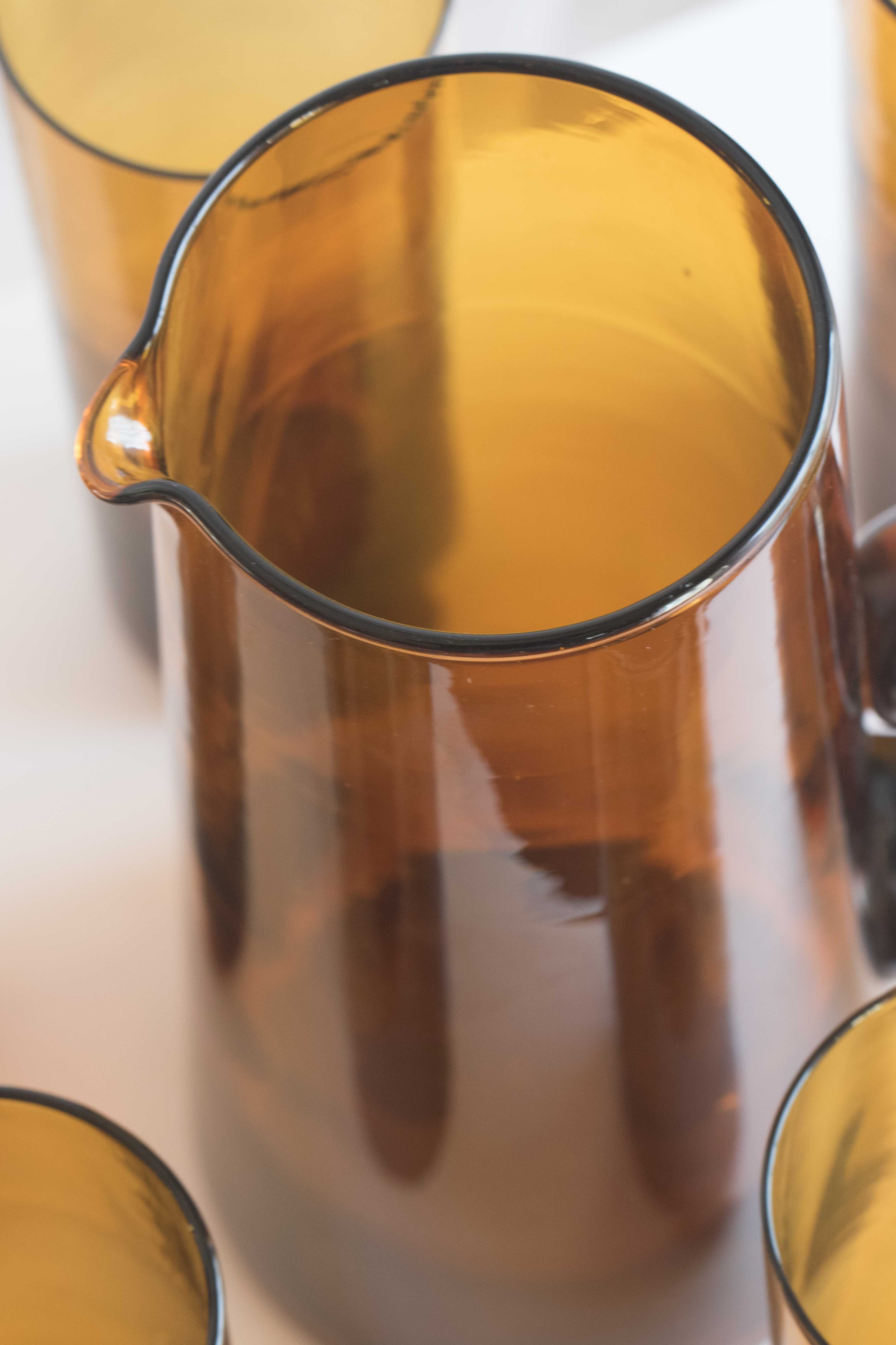 Orangeade in blown yellow glass service