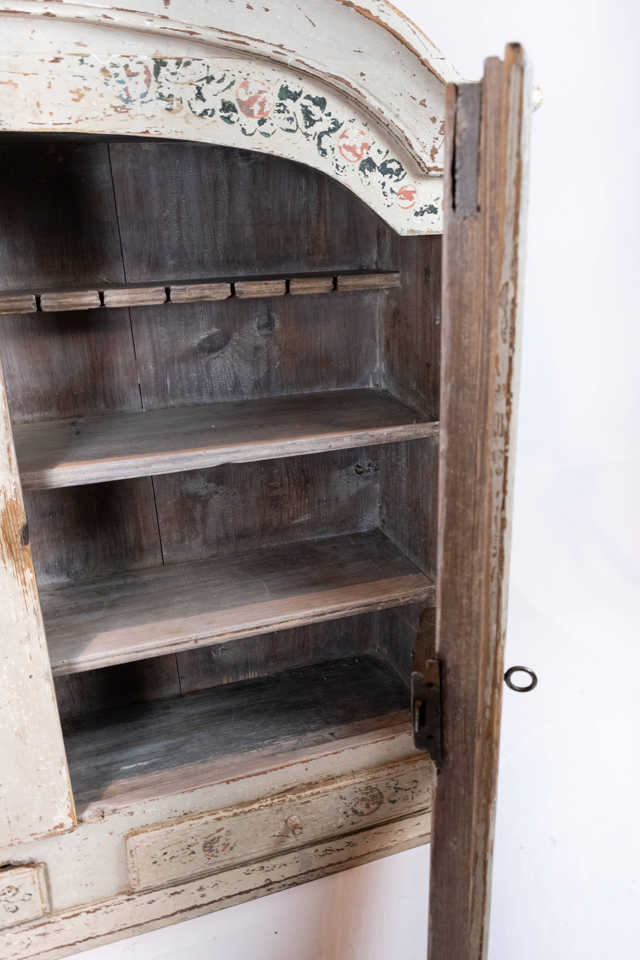 Grey painted hanging glass cabinet in gustavian style from around 1820