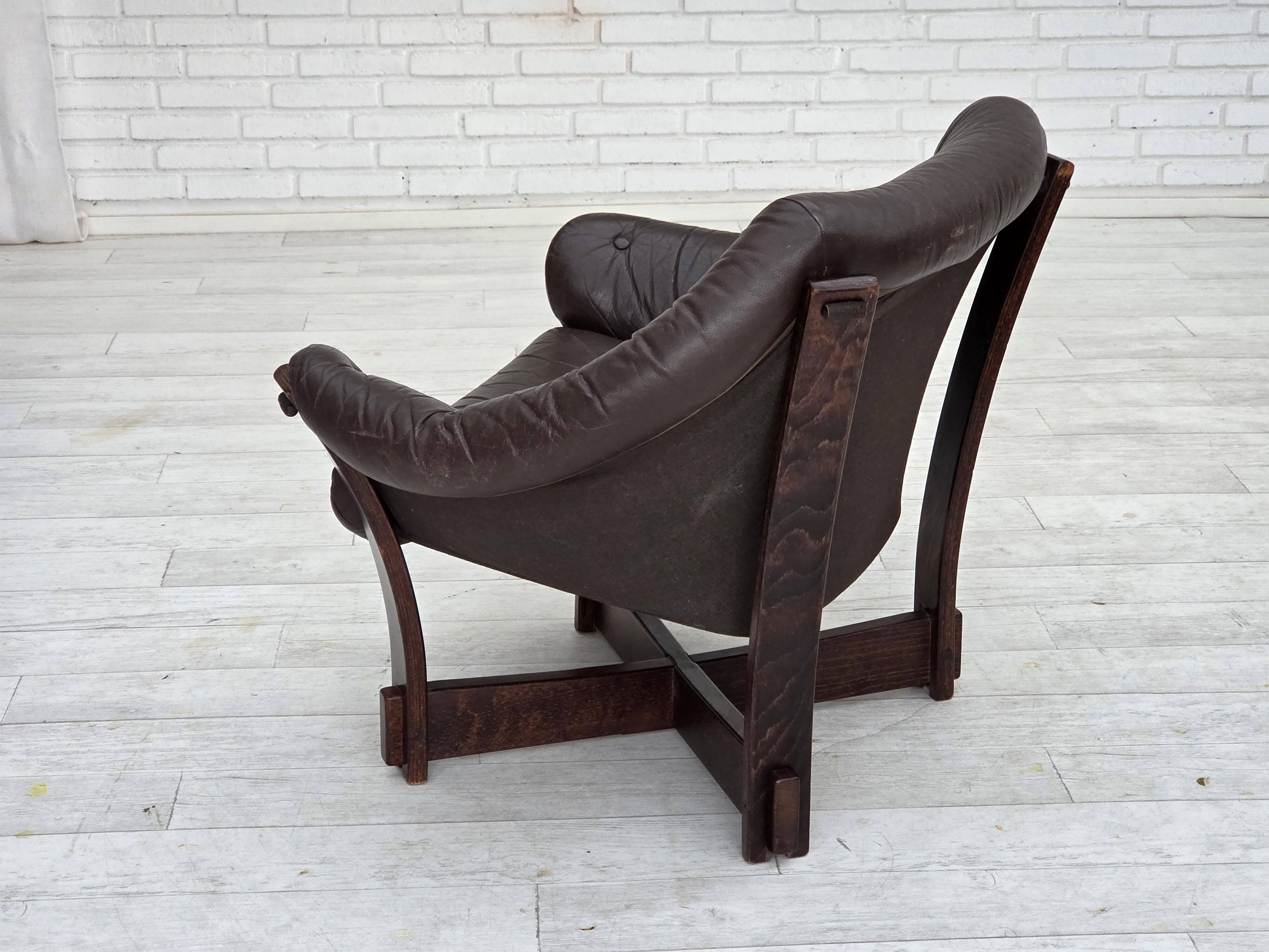 1970s, Scandinavian lounge chair, furniture leather, oak wood.