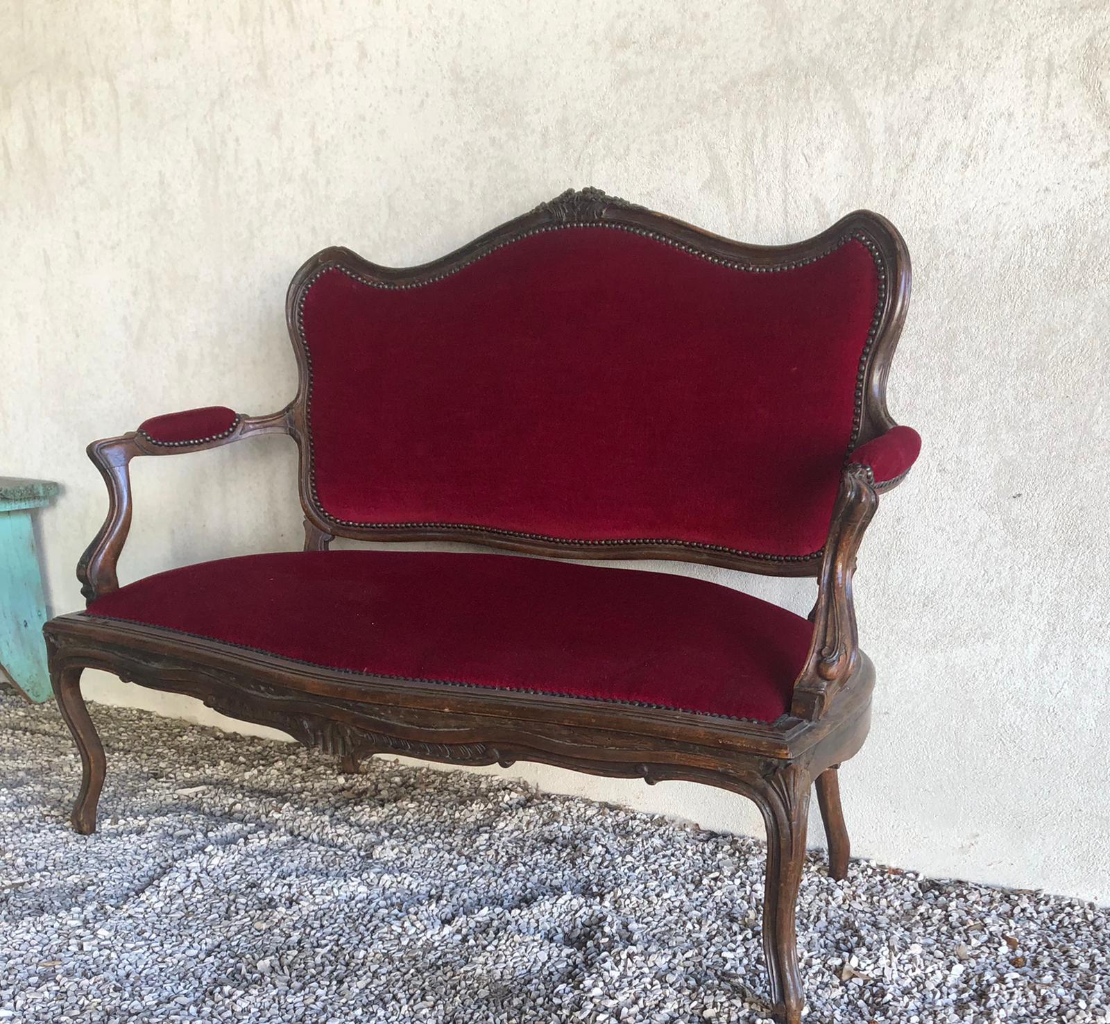 Louis XV style sofa trimmed with red velvet
