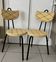 Pair of vintage retro mustard yellow chairs with black metal.
