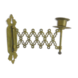 Wall-moving candlestick