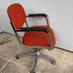 Fauteuil orange à roulettes Eurosit vintage 70’