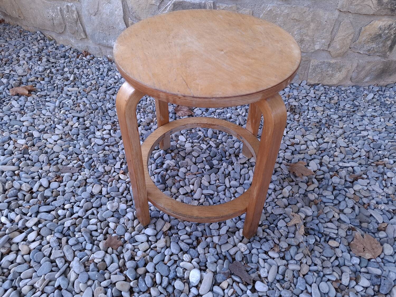 Vintage curved wooden stool