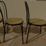 4 Chaises bistrot en métal noir et assise cannage plastique