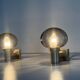 Pair of grey glass and chrome wall lights from the mid-century by N Leuchten, 1960s, Germany.