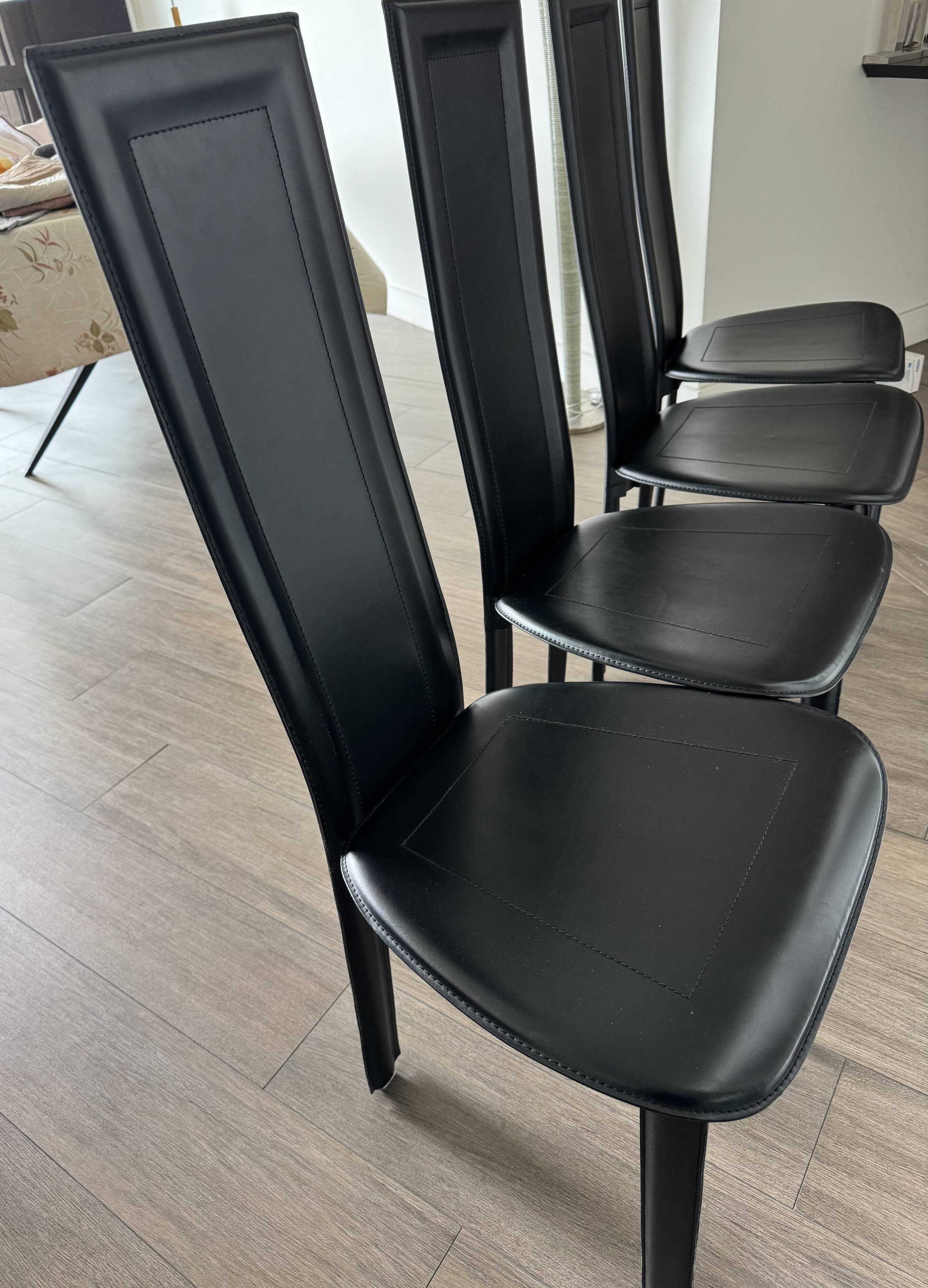 chaise de salle a manger cuir Roche Bobois