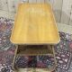 Rattan coffee table and caned shelf from the 1970s.
