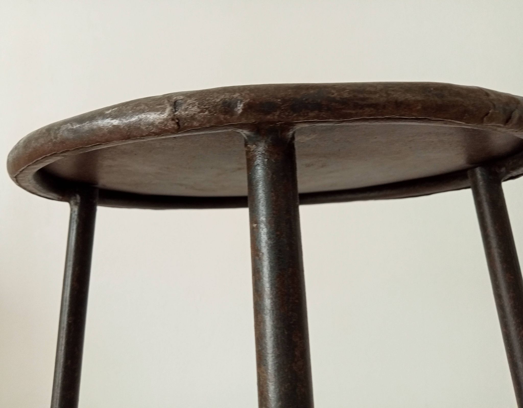 Brutalist high stool from the 1960s in solid steel.