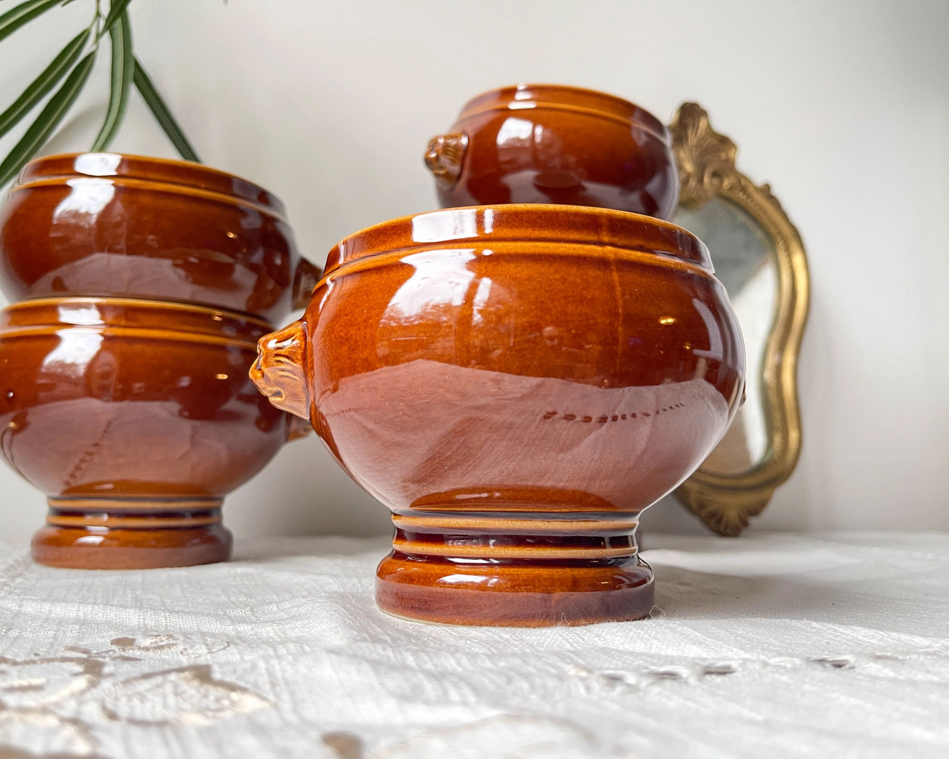 6 lion head bowls in ceramic, vintage brown style Emile Henry, made in France.