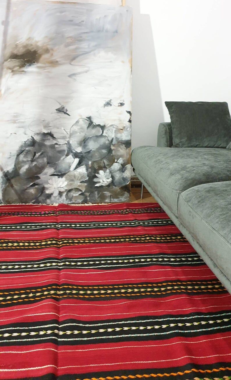 Hand-woven red wool rug