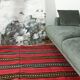 Hand-woven red wool rug