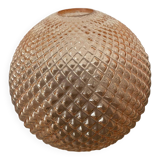 Spherical glass globe with pins. Salmon pink color