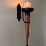 Large set of vintage modernist candle holders in iron and wood, in 2 pieces.