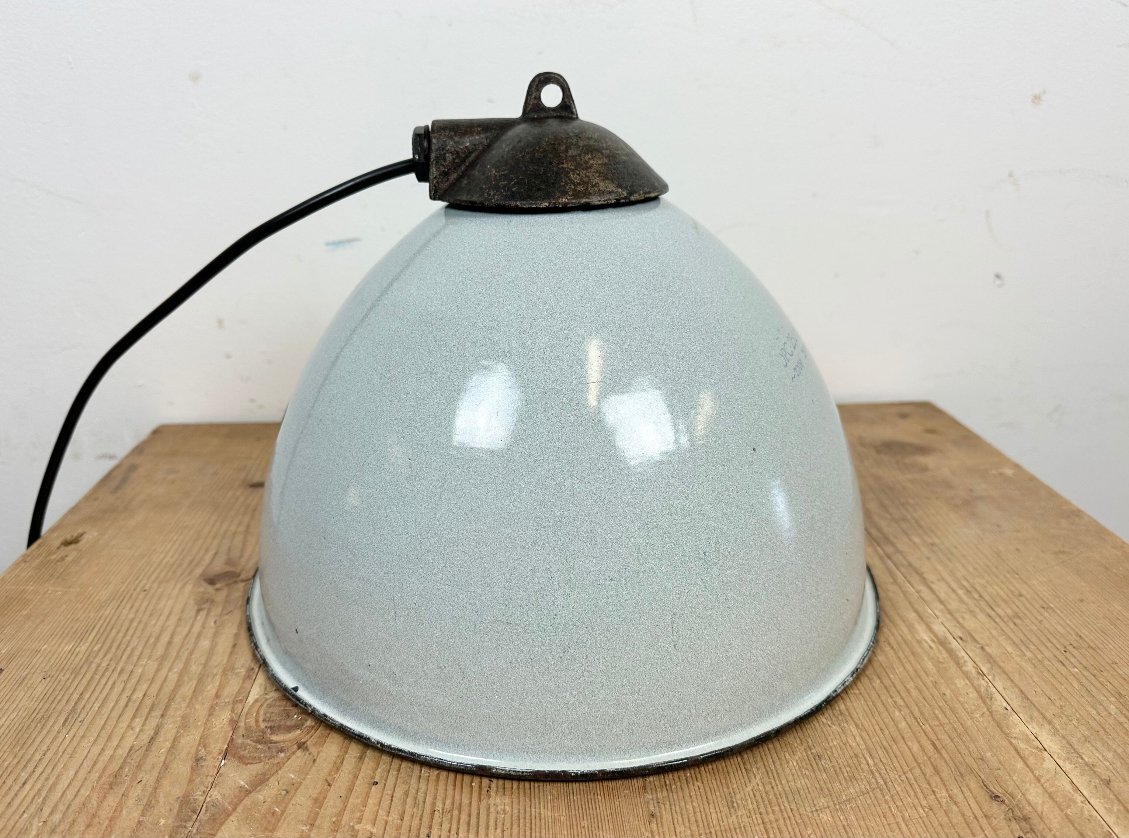 Industrial grey enamel factory lamp with cast iron top, 1960s