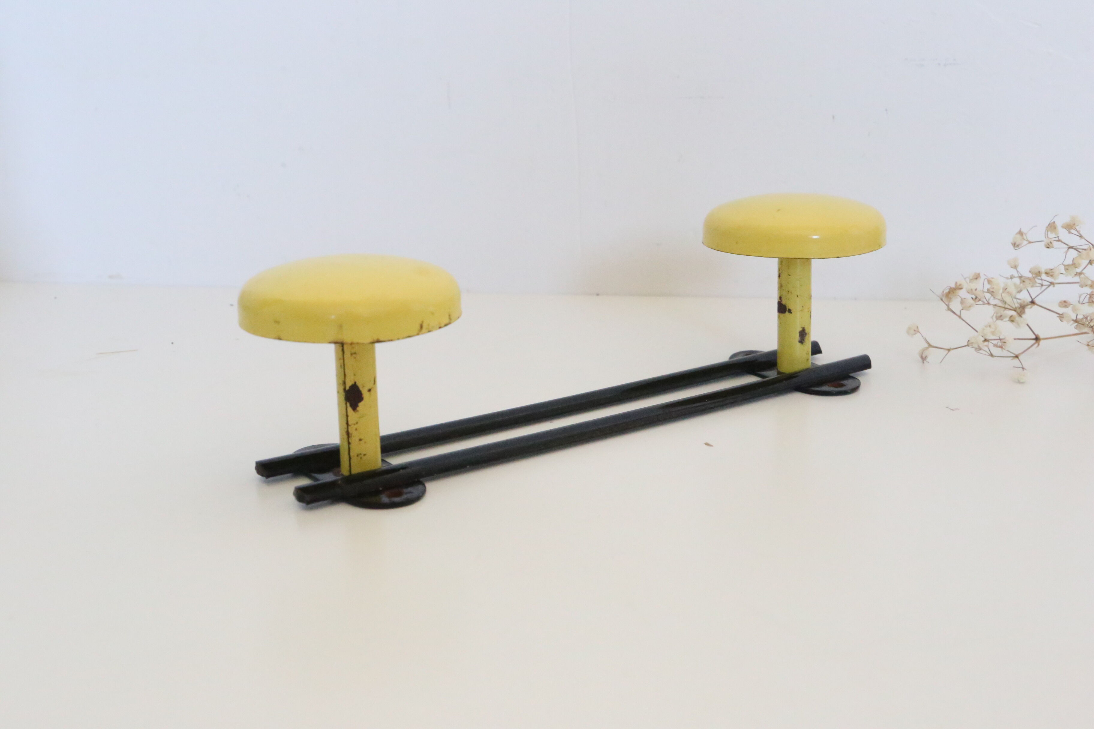 Wall coat rack in yellow and black metal, vintage