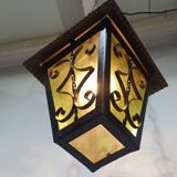 Wrought iron and green glass lantern