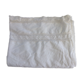 Linen sheet bordered by a wide lace and between two of lace