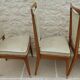 6 Vintage chairs in white beige imitation leather and solid wood with brass legs