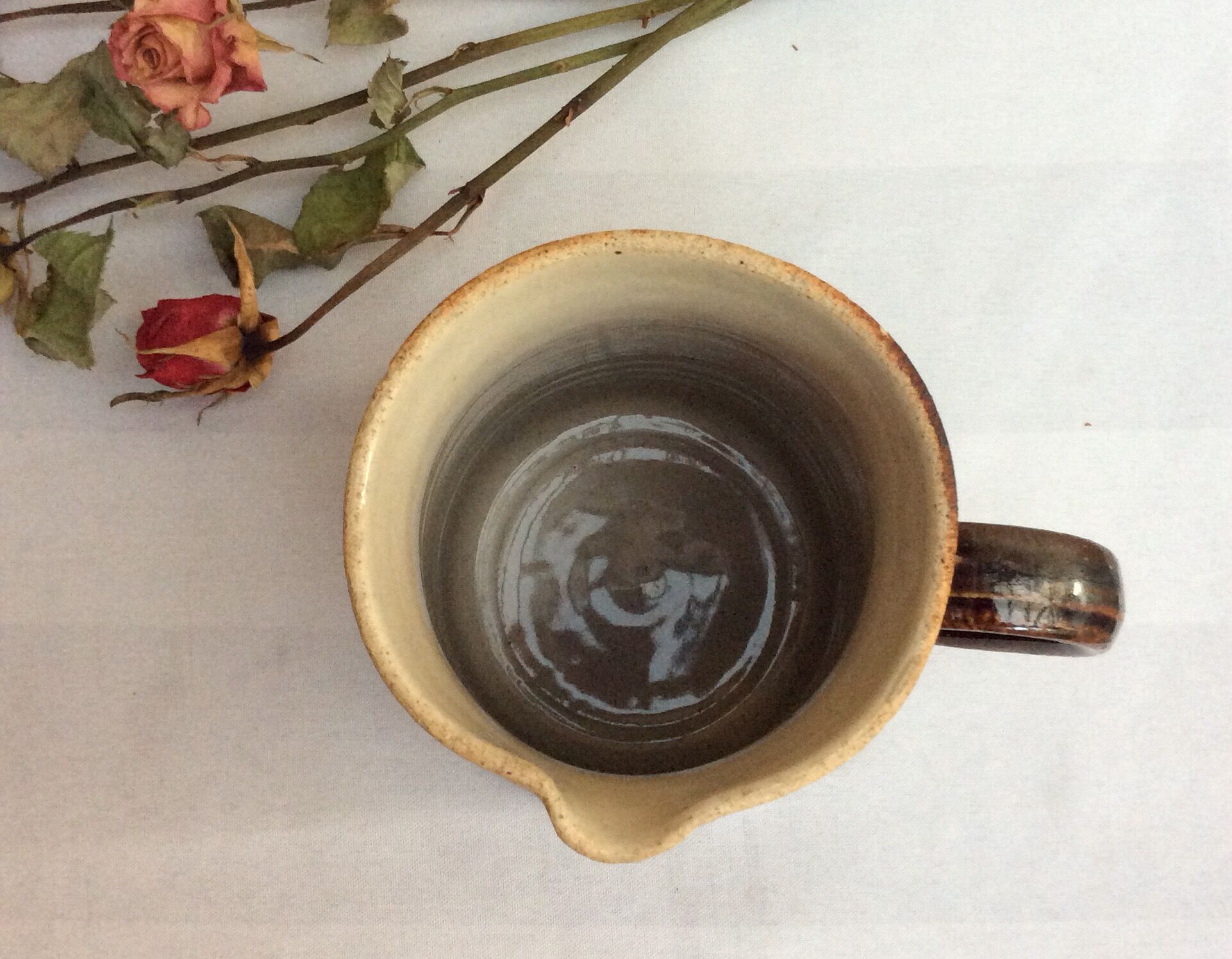 Old pitcher with glazed sandstone spout - 50s