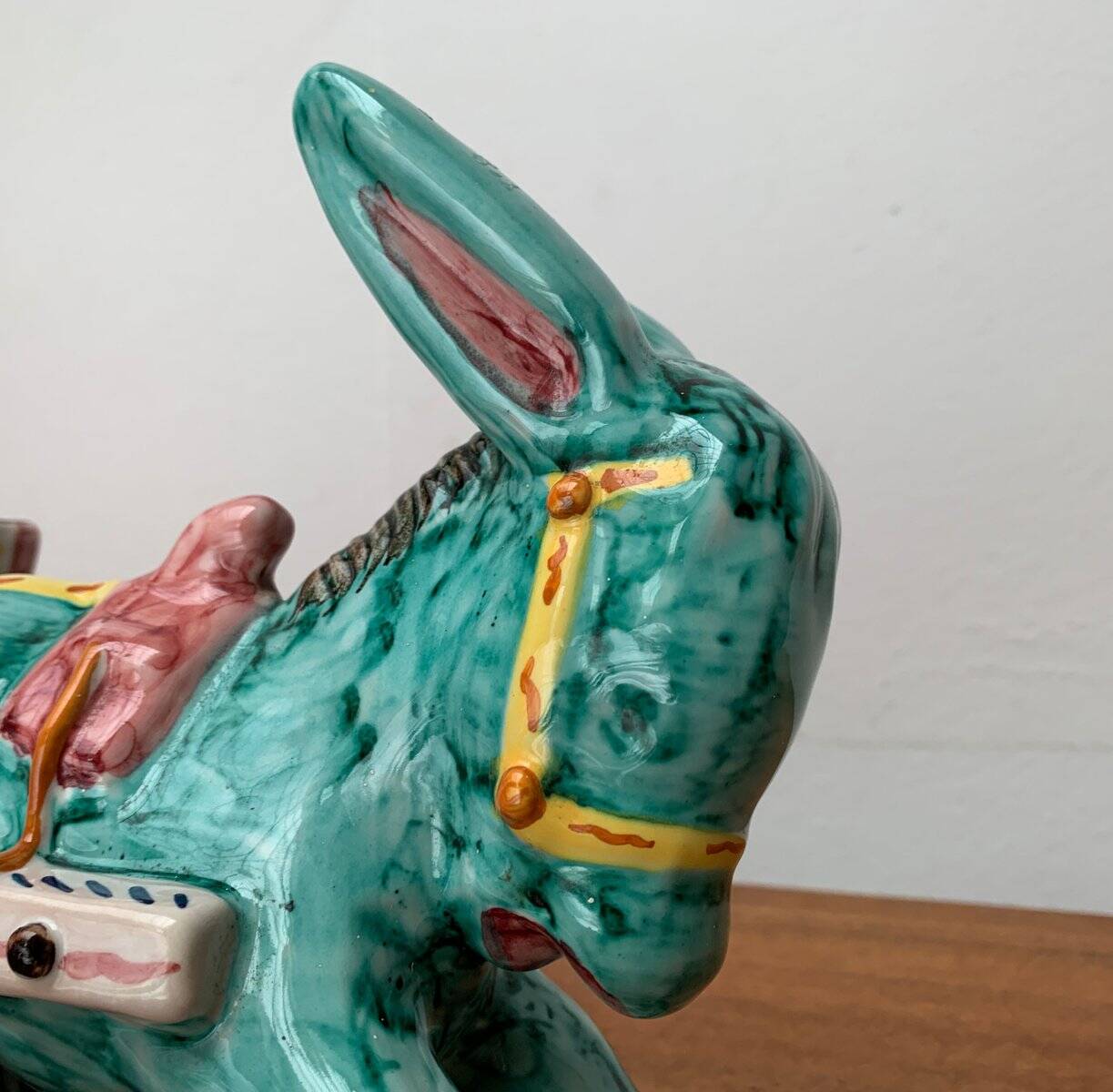 Vintage Italian hand-painted sculpture of a donkey with a cart in the shape of a bowl from Deruta, Italy.