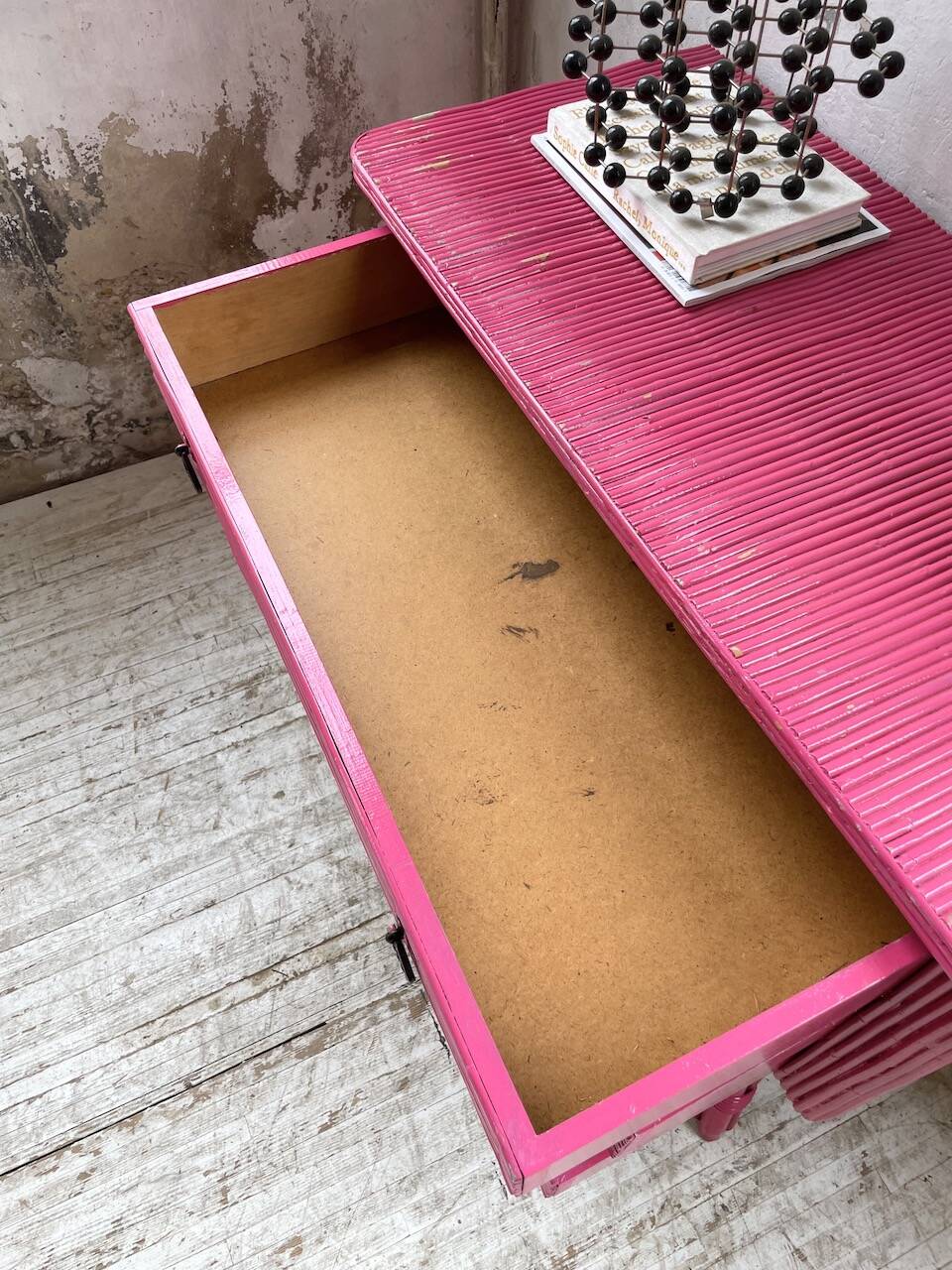 Vintage pink rattan chest of drawers