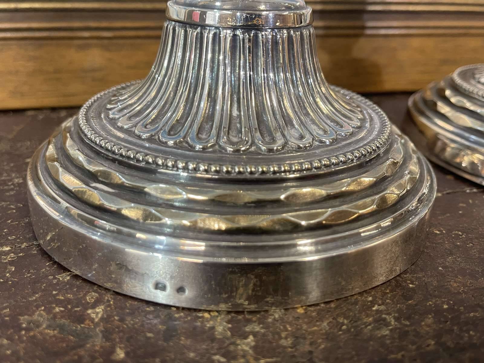Pair of silver-plated bronze candlesticks from the early 20th century