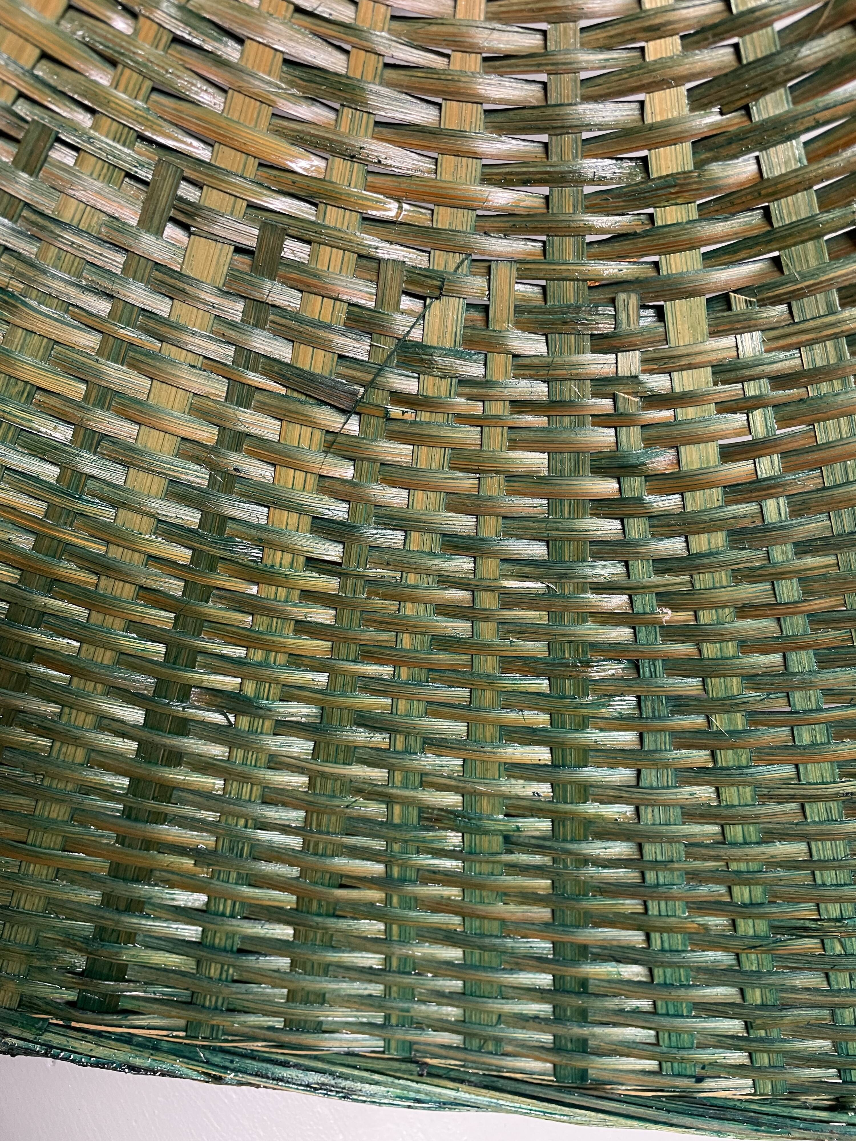 Suspension in green braided rattan