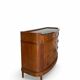 The demi-lune commode/ chest of drawers