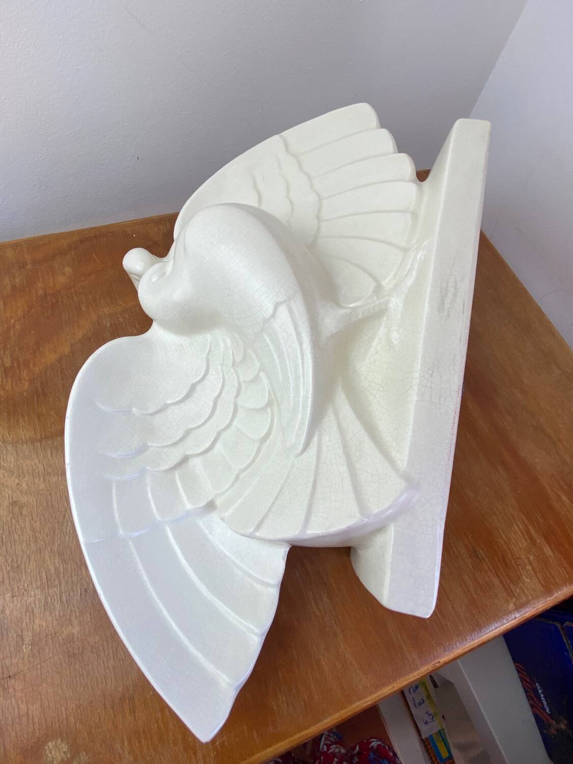 Cracked ceramic doves, signed Lejan