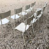 10 white school chairs