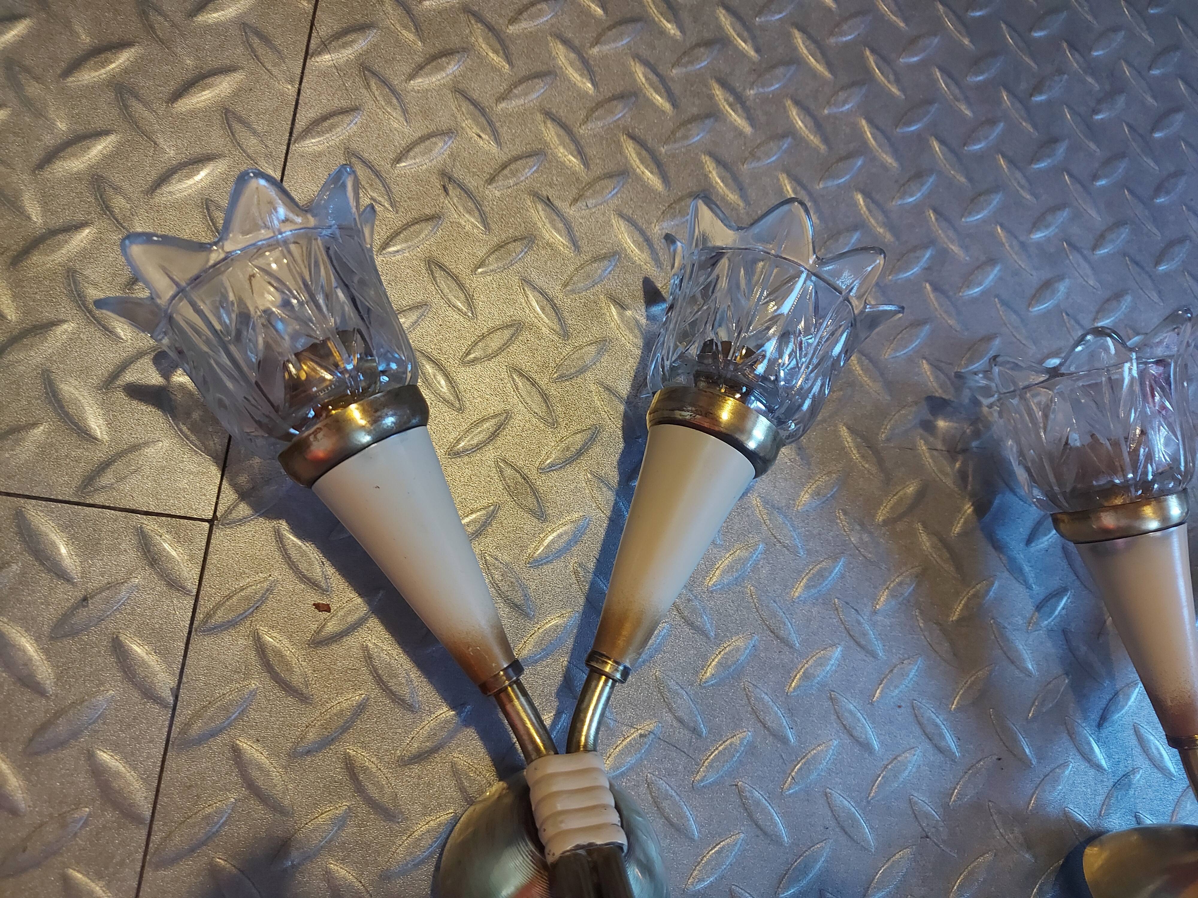 Pair of Lunel brass wall lamps