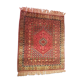 Former 19th century hand-woven Caucasian carpet