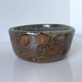 Stoneware empty pocket bowl with stylized floral decoration