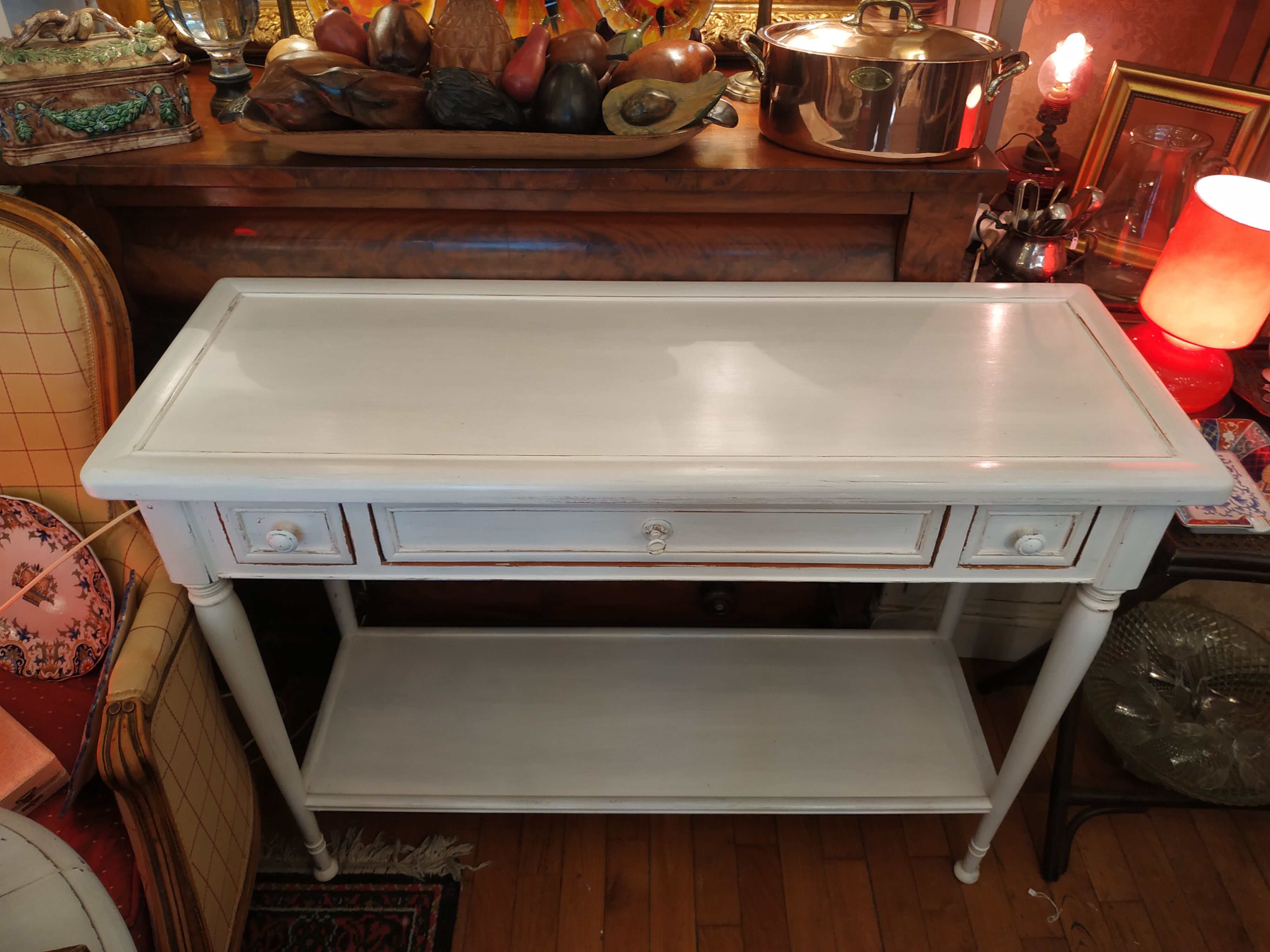 Linen-coloured patinated console