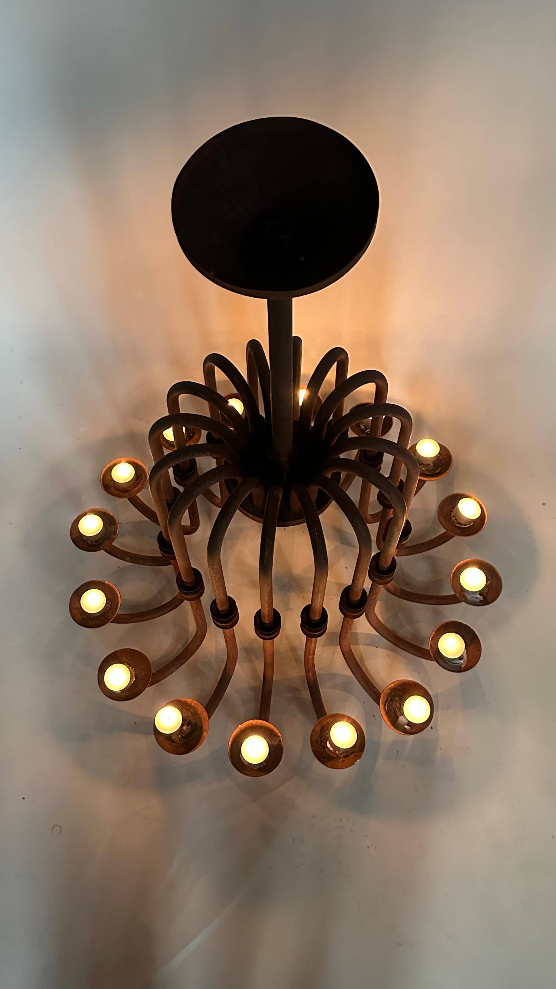 Large antique chandelier with 16 light arms