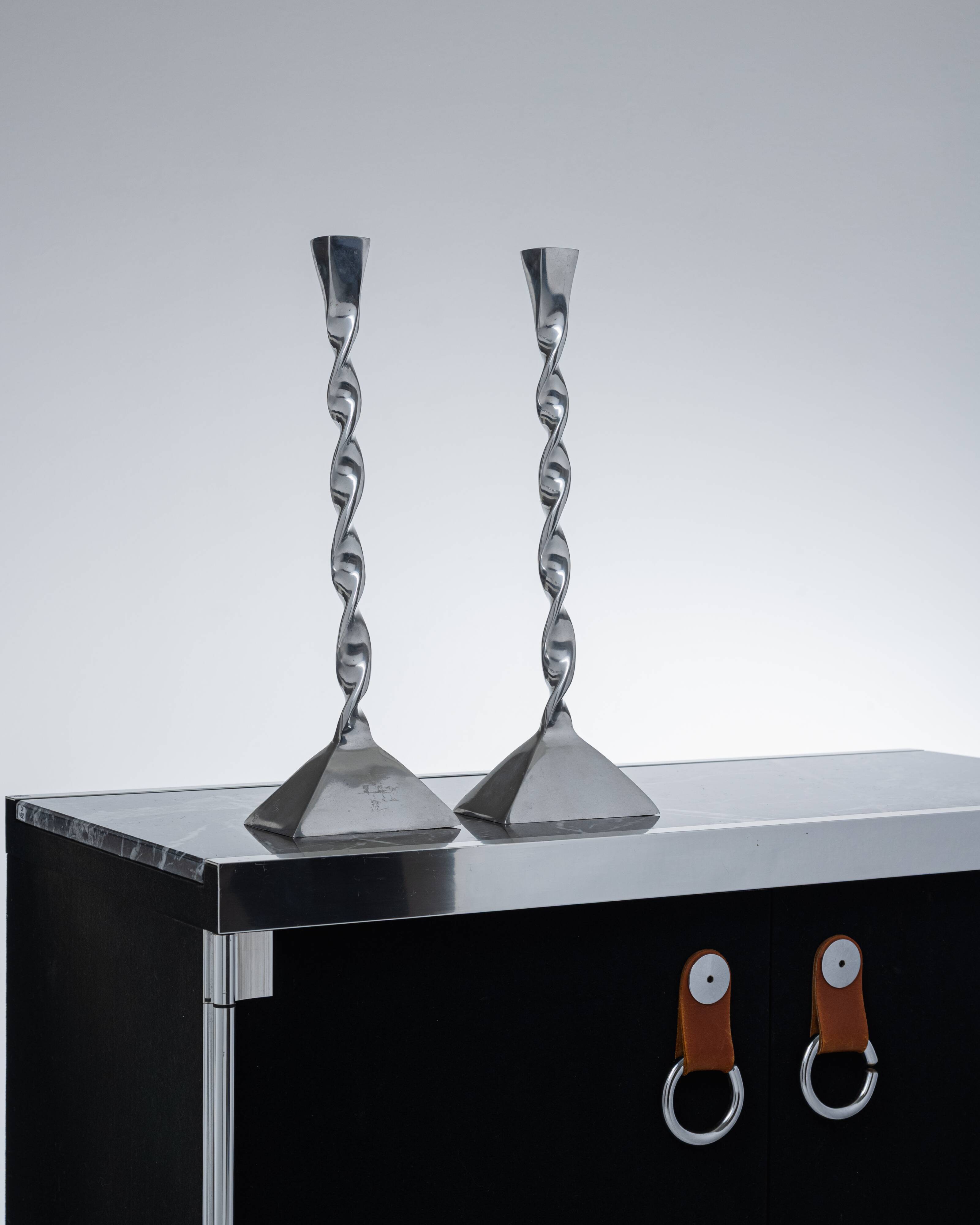 Pair of twisted metal candlesticks, 1980s