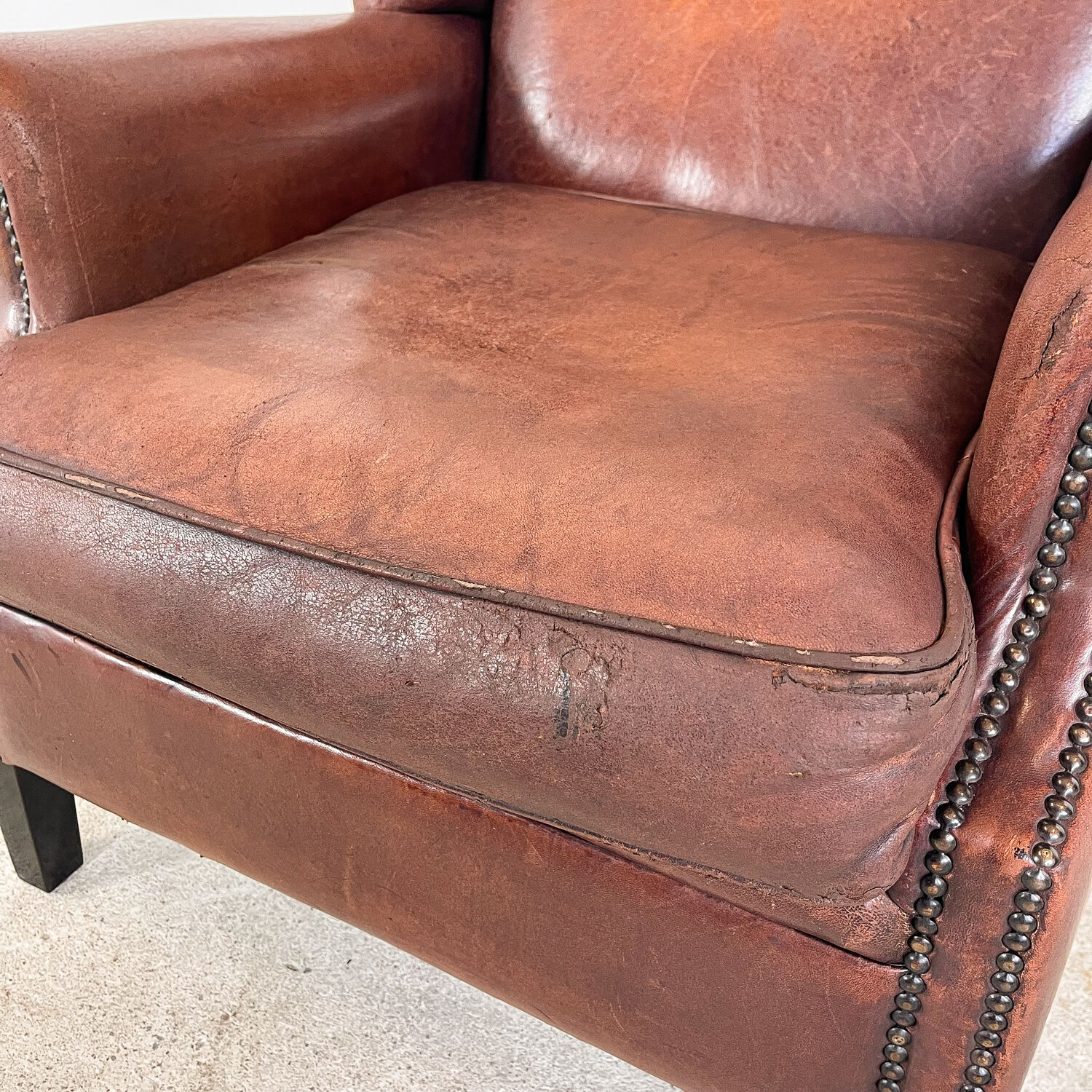 Vintage sheep leather wingback armchair, Druten